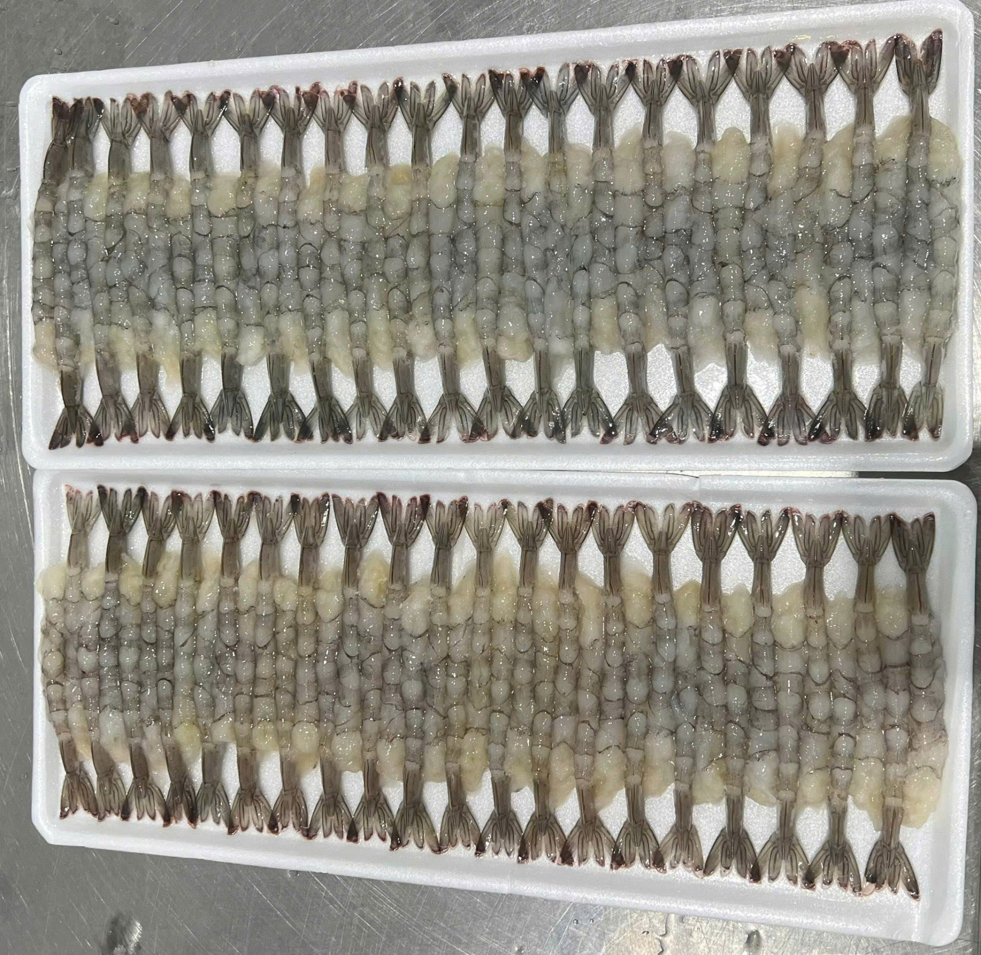 Raw butterfly shrimp, two trays